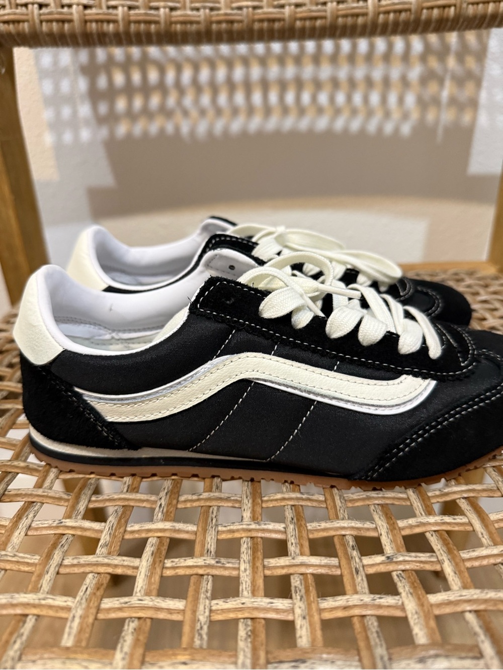 Vans Black and Cream Low-Top Sneakers